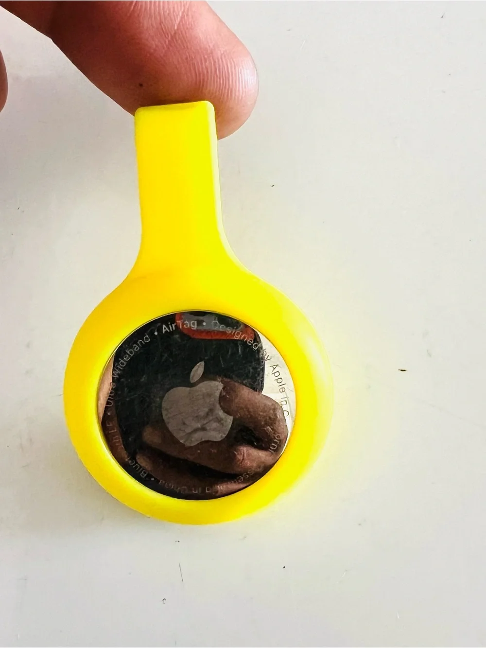 Apple AirTag in Yellow Silicone Clip Holder